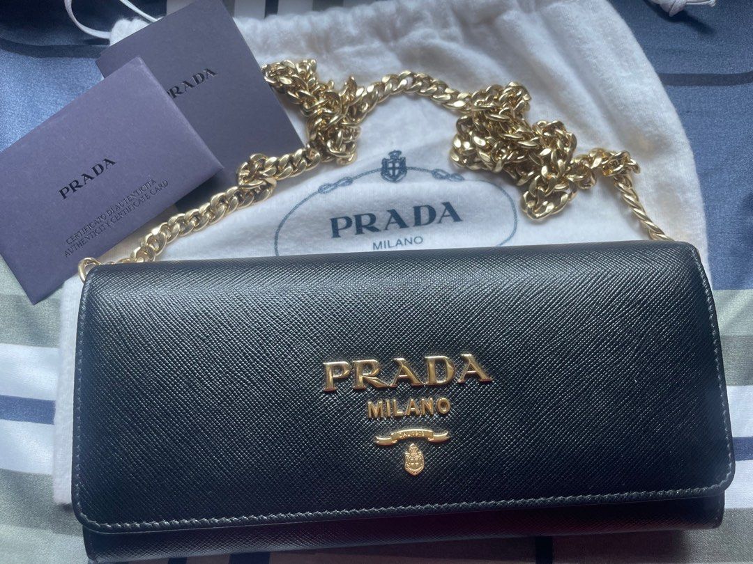 Prada wallet on chain in blue. 100% authentic. Came with original dusk bag  and receipt., Luxury, Bags & Wallets on Carousell