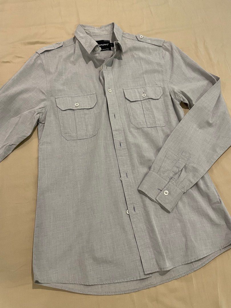 TOPMAN Button Down w/ long sleeves (Category: Formal Shirts) located in Paranaque City. Submitted by moedancing (Listing ID 1203703608, Image 3). Description: Grey button down Topman No flaws.