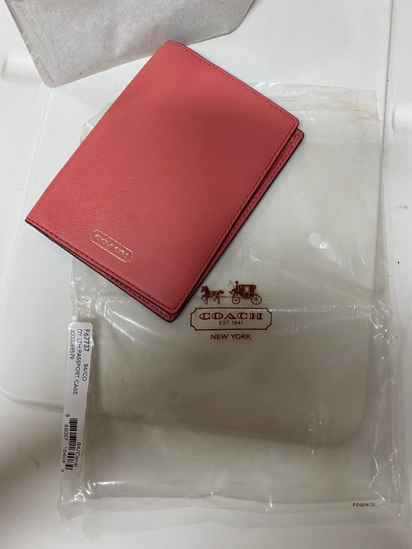 UNUSED AUTHENTIC Coach Passport Holder (Category: Luxury Bags & Wallets) located in Quezon City. Submitted by closetofcoco (Listing ID 1203588586, Image 1). Description: GUARANTEED AUTHENTIC PM FOR INQUIRIES NO LOW BALLING .