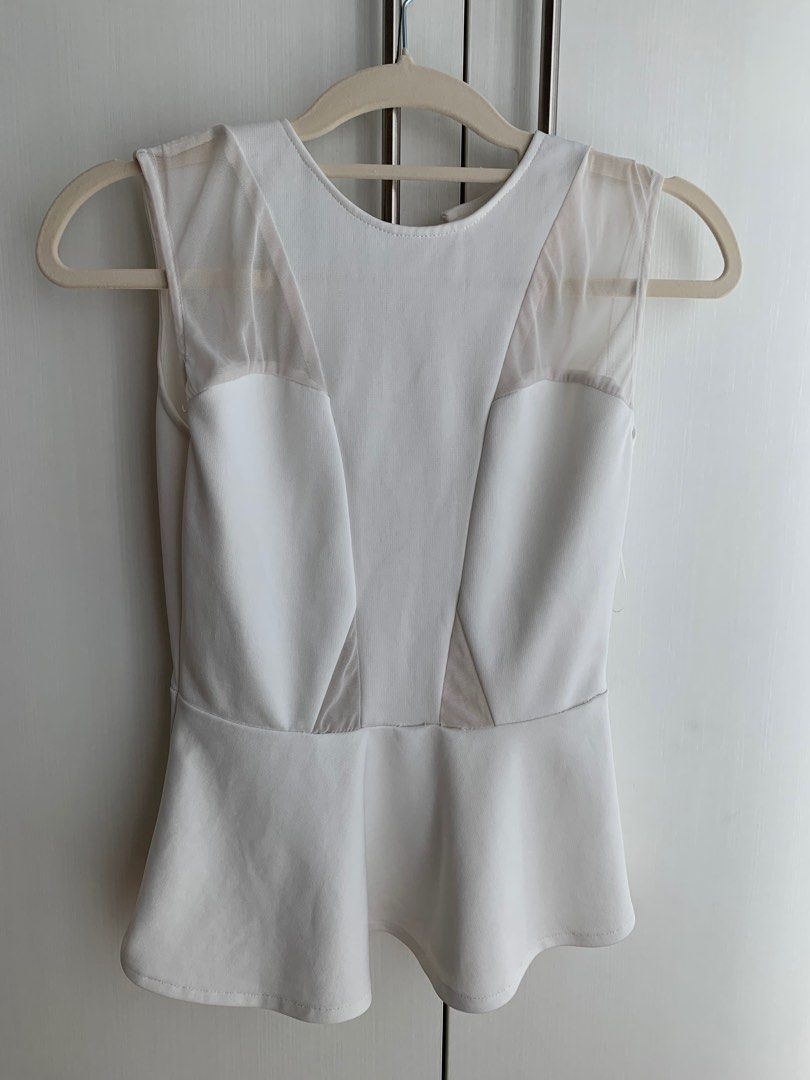 White Semi Formal Top Blanc Nour S (Category: Sleeveless) located in Mandaluyong City. Submitted by wisercolder (Listing ID 1203671086, Image 1). Description: Strictly worn once, lightly used and well-stored Bought for ~1,299 in SM Megamall PM for more pictures RFS: Closet declutter.