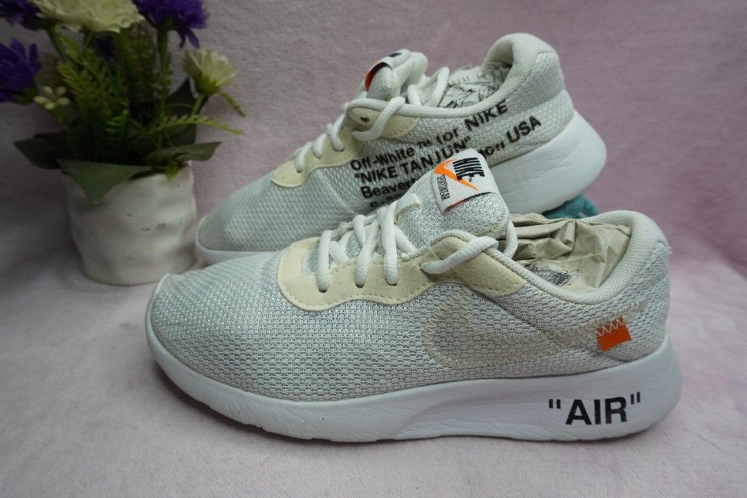 Nike tanjun x off white best sale
