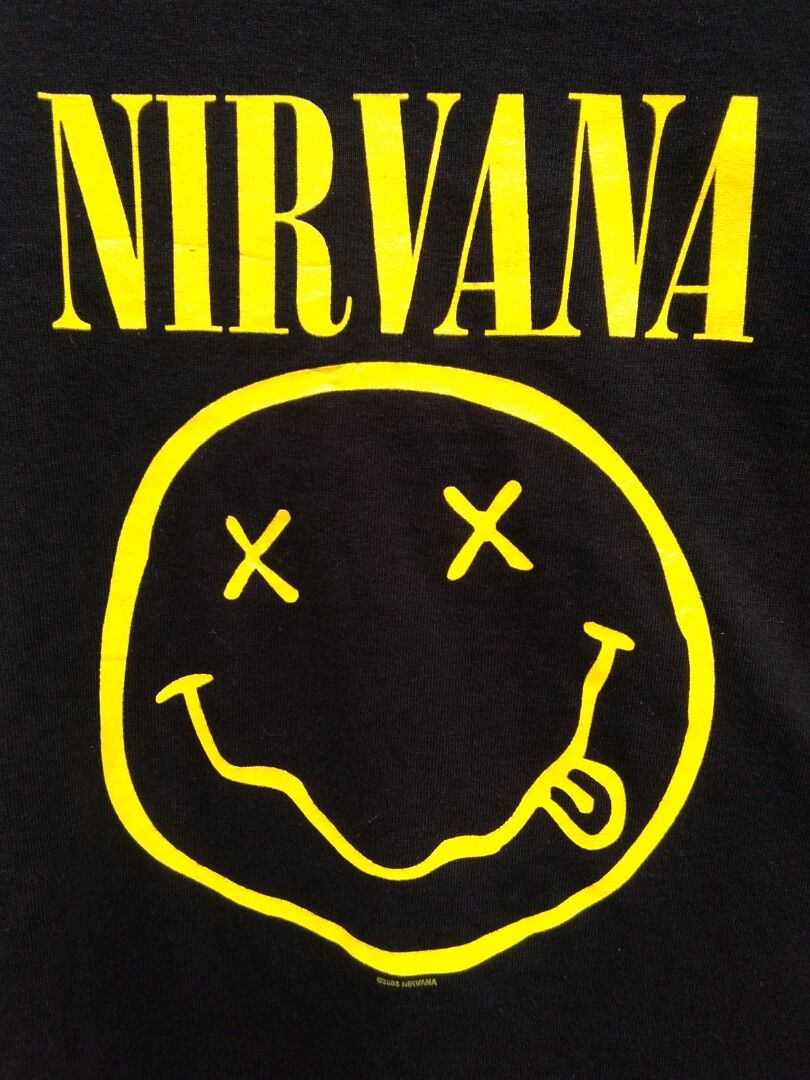 Nirvana anvil blue bar (Category: Tshirts & Polo Shirts ) located in Bagabag. Submitted by thrift_stories96 (Listing ID 1203930621, Image 2). Description: Nirvana anvil blue bar dated 2003 Small - 27.5 length 18 width Condition - excellent Color and cloth - 9.5/10 Flaw - dark blue stain sa shoulder from bale,not noticeable..
