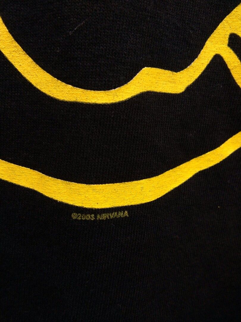 Nirvana anvil blue bar (Category: Tshirts & Polo Shirts ) located in Bagabag. Submitted by thrift_stories96 (Listing ID 1203930621, Image 3). Description: Nirvana anvil blue bar dated 2003 Small - 27.5 length 18 width Condition - excellent Color and cloth - 9.5/10 Flaw - dark blue stain sa shoulder from bale,not noticeable..