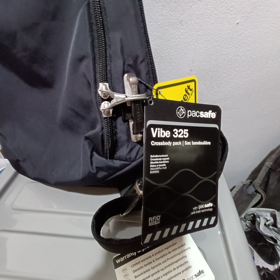 Pacsafe vibe 325 crossbody pack new, Men's Fashion, Bags, Sling Bags on ...