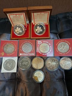 Singapore $5/$10/$50 mix coin.