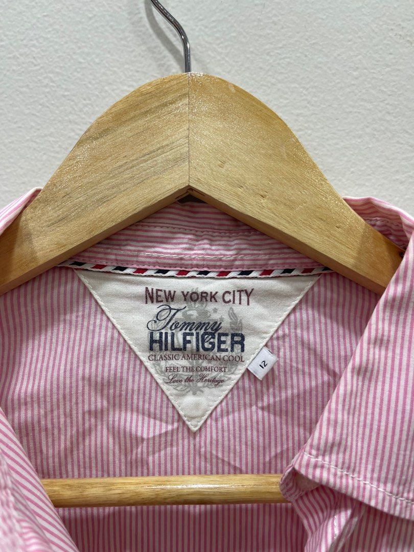 Tommy Hilfiger Pink Polo Shirt (Category: Babies & Kids Fashion) located in Taguig. Submitted by lala_f (Listing ID 1203824599, Image 2). Description: .