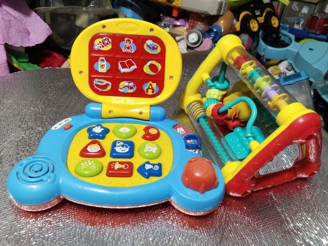 Vtech laptop at rattle toy (Category: Infant Playtime) located in Cavite. Submitted by dimple082 (Listing ID 1203871358, Image 2). Description: good condition @499.