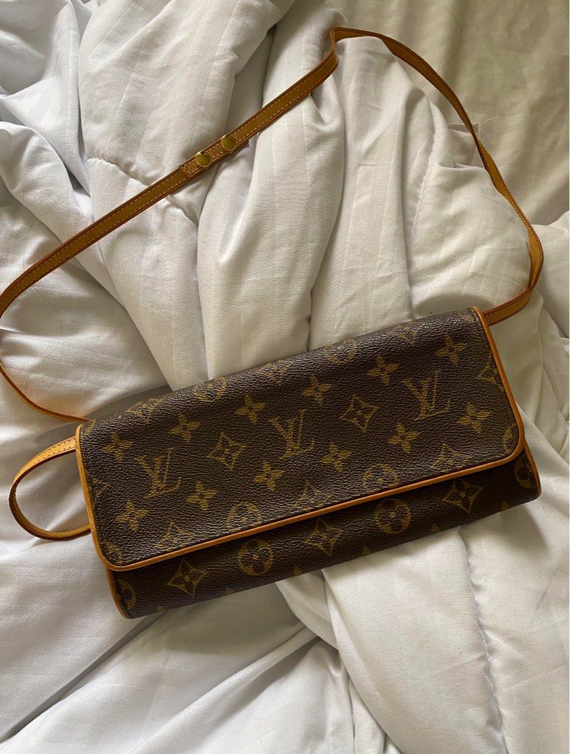 Authentic LV Twin Pochette Gm (Category: Luxury Bags & Wallets) located in Manila. Submitted by preby.a (Listing ID 1204076422, Image 1). Description: Authentic Slight flaw on the strap but can be hidden inside :) Can be used as a clutch Comes with 2 free chains Comes with LV pouch! Slightly negotiable.