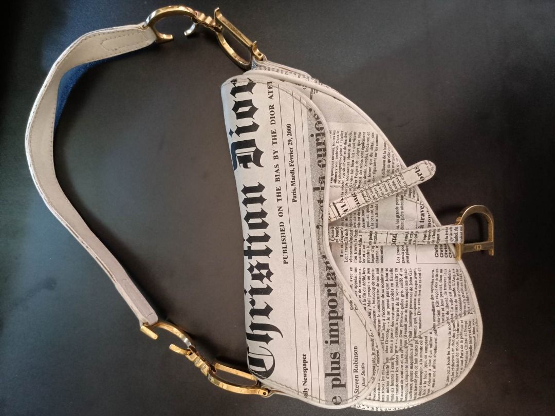 Dior newspaper saddle bag clearance