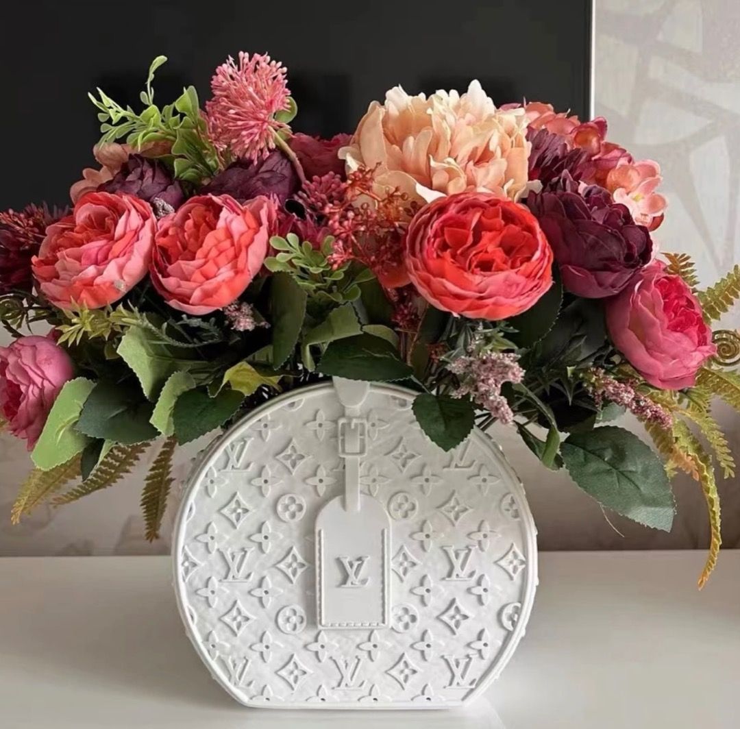LV Round canvas Bag Vase- Handmade Resin designer bag vase (Category: Women's Accessories) located in Sydney. Submitted by nazihader (Listing ID 1203963307, Image 1). Description: 🌸Decorate your home with this sculpture / vase! Limited stocks, pls order asap!! 📍Size: 28*20*10 cm Shipping takes around 7-15 days. [FREE DELIVERY] *Pls note orders might be delayed during Christmas period. However, we will try our best to deliver to you asap. Thanks