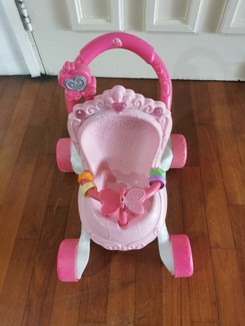 Musical toy pram walker, Hobbies & Toys, Toys & Games on Carousell