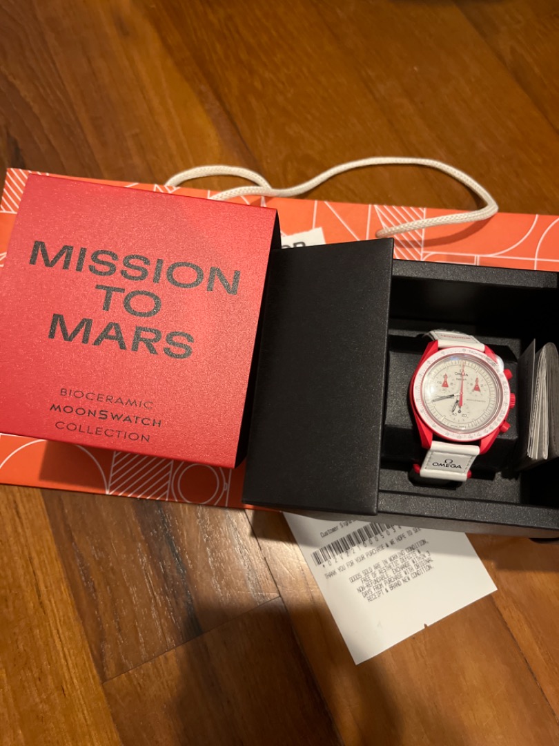 Omega red swatch moonswatch watch box mission to mars blue pink