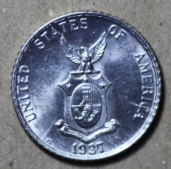 Philippines USPI 10 Centavo 1937 Manila Minted Silvercoin (Category: Currency) located in Dumaguete. Submitted by MelodyValuables (Listing ID 1203994471, Image 1). Description: I offer here a perfect example of an 1937 M silver Coin. This 10 centavo coins was never in circulation and is well preserved. What you see is what you get Have a Peek at our other Coin Offers. I am offering there much more rare Banknotes and Coins. .