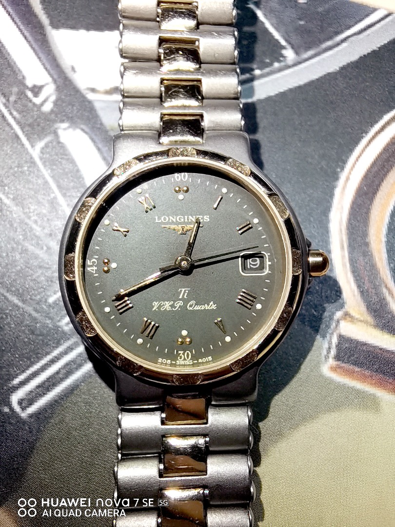 Longines conquest outlet titanium price