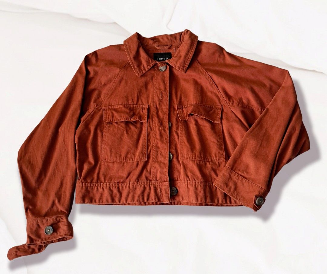 Cropped button jacket (Category: Coats, Jackets and Outerwear) located in Singapore. Submitted by dhaniahstuff (Listing ID 1204276311, Image 1). Description: Cotton on cropped button jacket -colour is like Thai milk tea type of shade -condition: 9/10 -impulsively bought.
