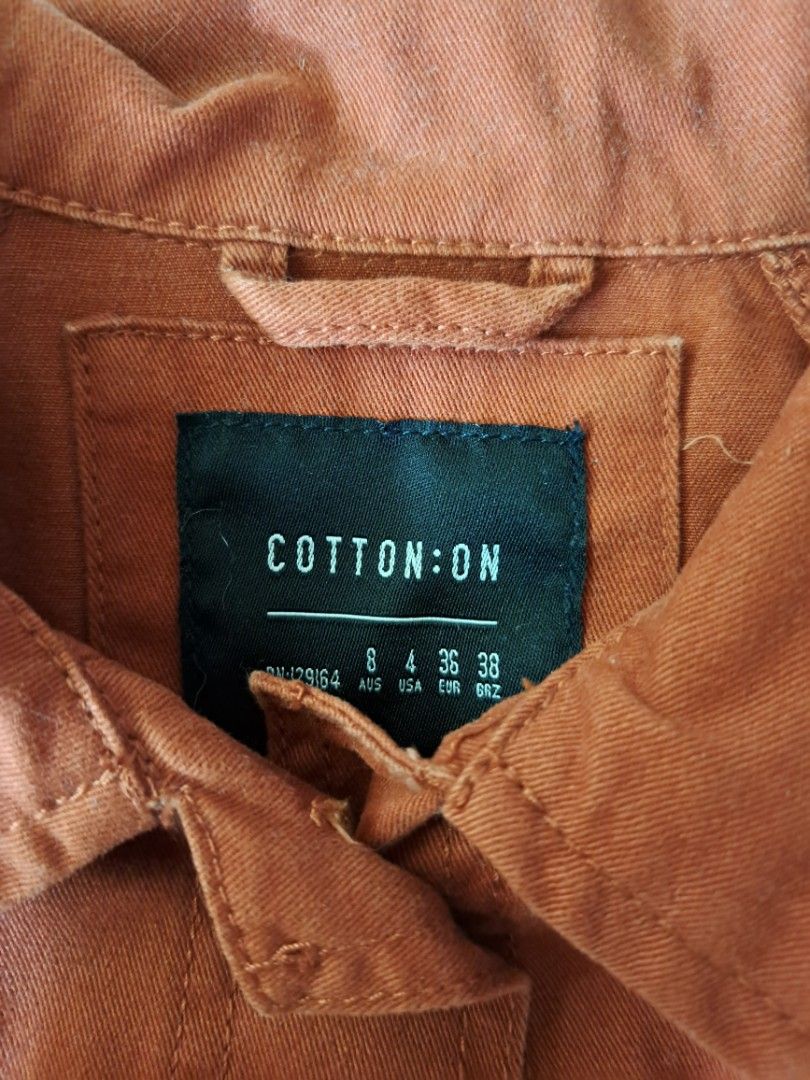 Cropped button jacket (Category: Coats, Jackets and Outerwear) located in Singapore. Submitted by dhaniahstuff (Listing ID 1204276311, Image 2). Description: Cotton on cropped button jacket -colour is like Thai milk tea type of shade -condition: 9/10 -impulsively bought.