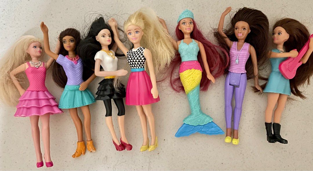 Mini Barbie Set (Category: Kids Toys) located in Manila. Submitted by my2ndedition (Listing ID 1204385764, Image 1). Description: Small size barbies. Selling as set. Nice collection for your little girl..