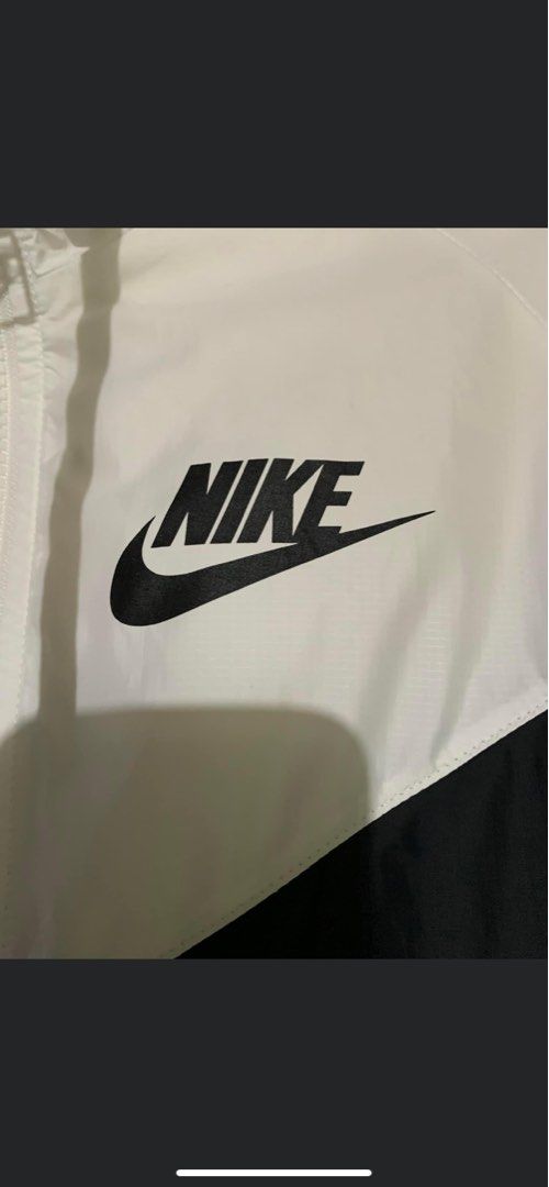 Nike (Category: Coats, Jackets and Outerwear) located in San Juan City. Submitted by rvsouk (Listing ID 1204214542, Image 3). Description: NIKE WOMEN’s Windrunner Jacket Color: Black/White Size S on Tag Dimes: W: 19 L: 23 inches Price: 1,300 + Sf Excellent/good as new.