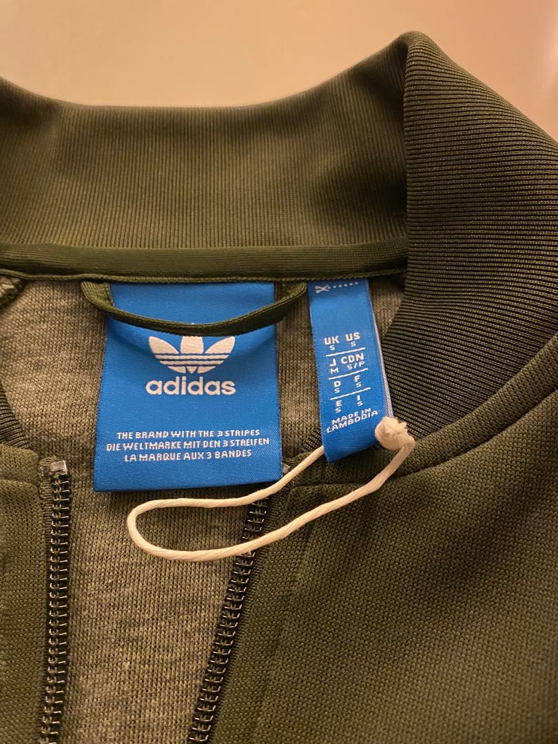 Adidas superstar olive jacket deals