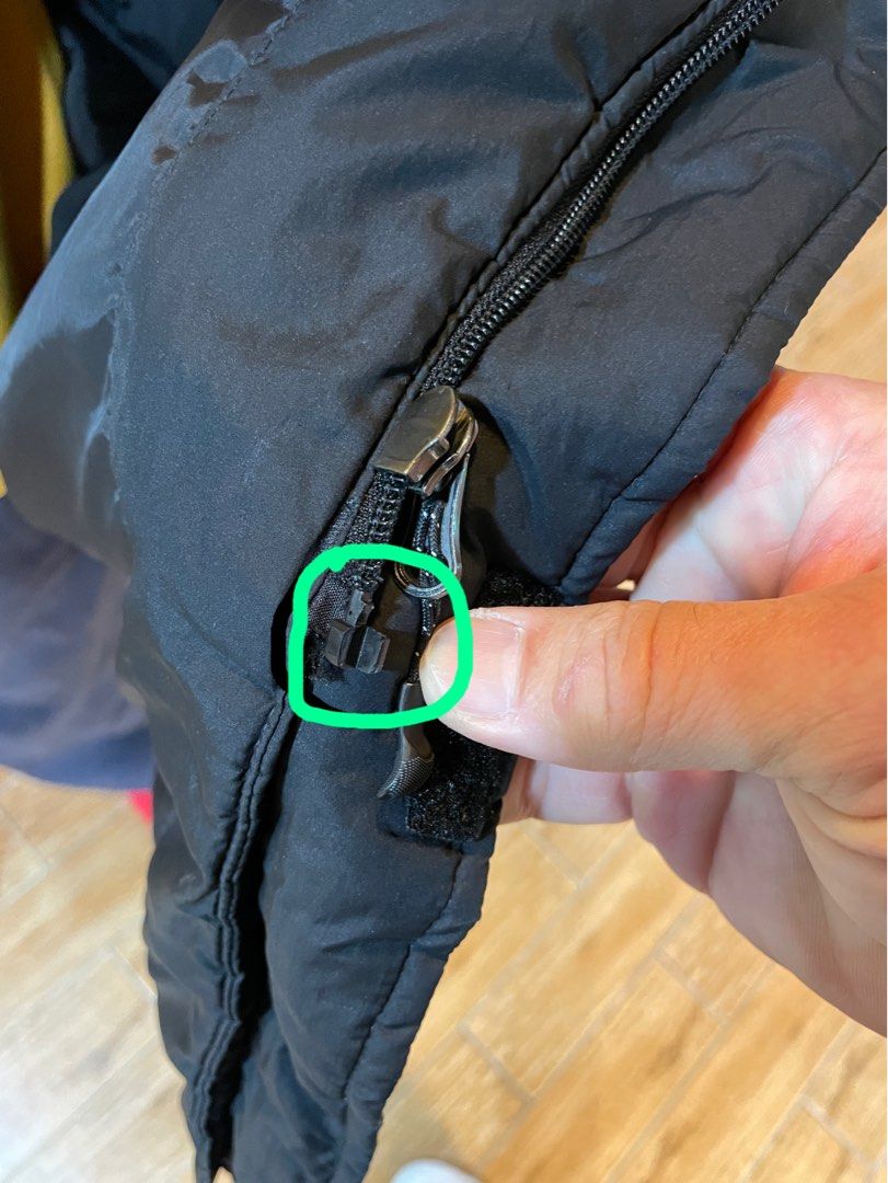 Winter Jacket (Category: Coats, Jackets and Outerwear) located in Singapore. Submitted by mickeymouss (Listing ID 1204302841, Image 5). Description: Puffy winter jacket, keep you super warm, there is sign of some small little holes and end of the zip holder chip off but can still zip or alternatively can use the Velcro. .