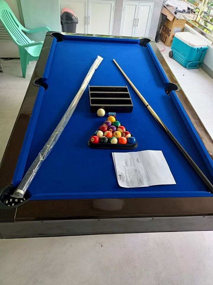 42X74 BILLIARD TABLE with COMPLETE ACCESSORIES (Category: Billiards and Bowling) located in San Pablo. Submitted by ablpsports (Listing ID 1204447181, Image 3). Description: SPECS -MADE IN SOLID WOOD MATERIAL -MEDIUM DENSITY FIBER BOARD ACCESSORIES INCLUDED -1 SET. TAIWAN BILLIARD BALL 2 INCHES -1 PC. WOODEN TRIANGLE RACK 2 INCHES -2 PCS. BILLIARD CUE STICK -1 PC. BALL RACK -2 PC. BILLIARD CHALK 09063172615/ globe ANGELIKA.
