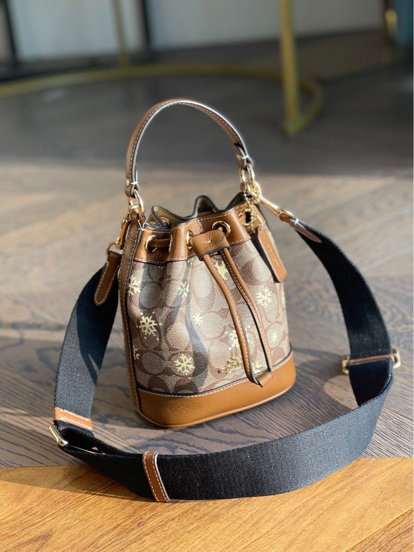 COACH®  Dempsey Drawstring Bucket Bag 15 In Signature Canvas With Star And  Snowflake Print