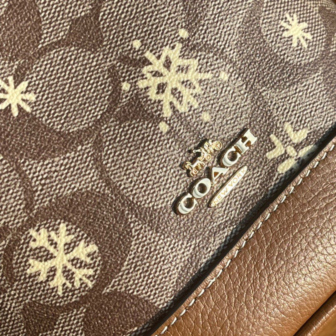 COACH®  Dempsey Drawstring Bucket Bag 15 In Signature Canvas With  Snowflake Print