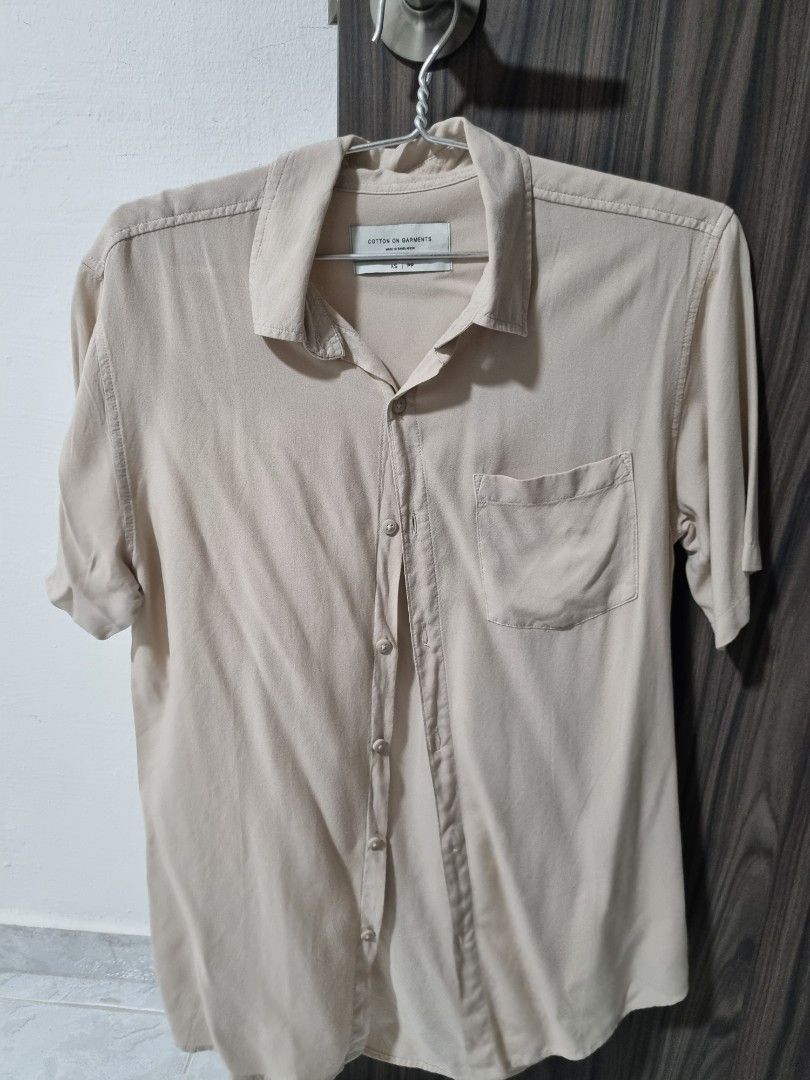 beige button up shirt