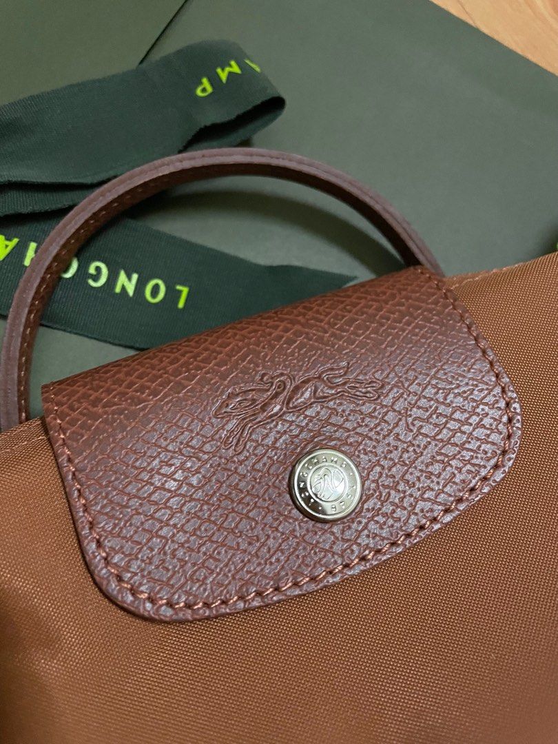 New Longchamp Le Pliage Green Pouch (Cognac/Brown), Women's Fashion, Bags &  Wallets, Purses & Pouches on Carousell