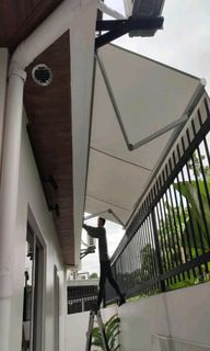RETRACTABLE AWNING CANOPY