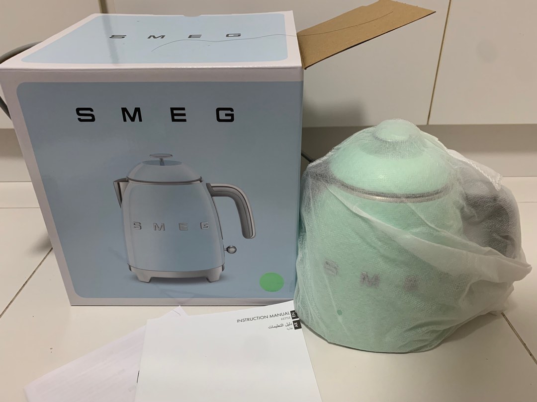 https://media.karousell.com/media/photos/products/2022/12/22/smeg_mini_kettle_08l__pastel_g_1671719774_cb8a96c6.jpg