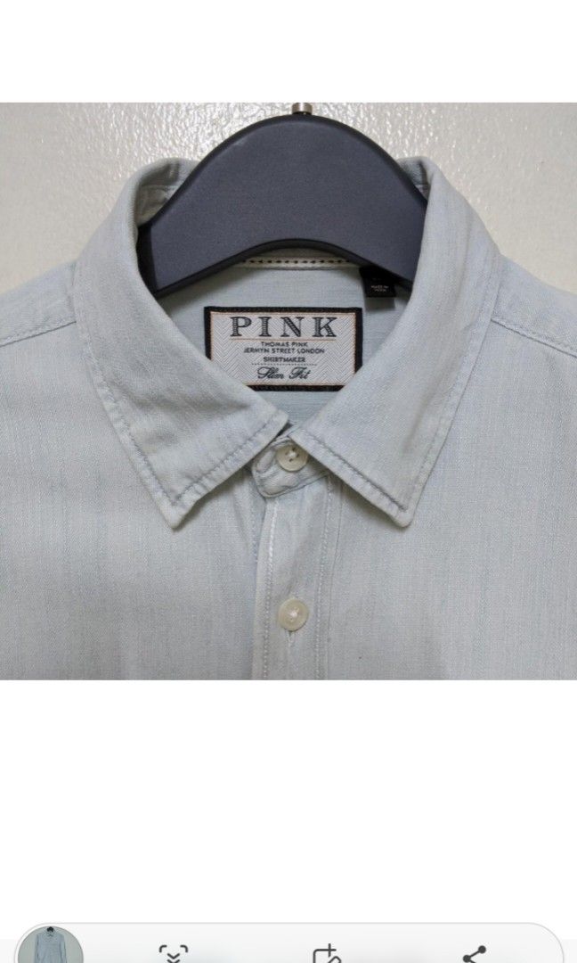 Thomas Pink Light Denim Shirt (Category: Formal Shirts) located in Binan City. Submitted by theformer (Listing ID 1204753470, Image 2). Description: Size on tag: XS (Fits like an S) Measurements: Chest - 19 in Shoulders - 17 in Sleeves - 26.5 in Length - 27.5 in Search: Denim shirt, Button down, Polo, Top, Collar, Long Sleeve.