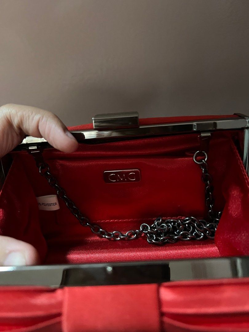 cmg red box clutch (Category: Purses & Pouches) located in Quezon City. Submitted by second___life (Listing ID 1204940747, Image 2). Description: cmg red box clutch missing two gems sa bottom part, hence selling low perfect for special events like weddings, parties, etc used few times only has a built in chain strap that can be stored inside if you’d rather hold it as a box clutch.