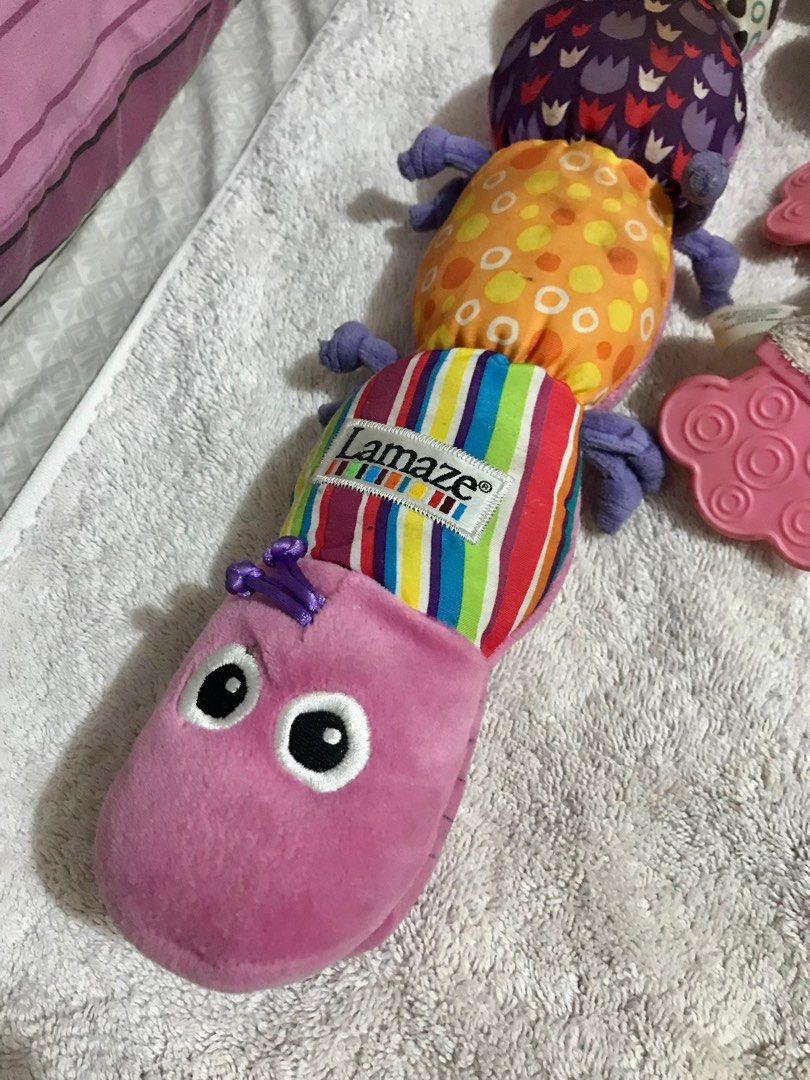 Lamaze baby toys (Category: Infant Playtime) located in Quezon City. Submitted by tinylittlecorner (Listing ID 1204971244, Image 1). Description: Lamaze toys with sensory play whether its texture, rattles, and colorful Inchworm P300 Dog & Doll P200 Frog rattle inside P100 Elephant teether P100 Playmat P300 Package take all P900 *They are dusty from storage only.