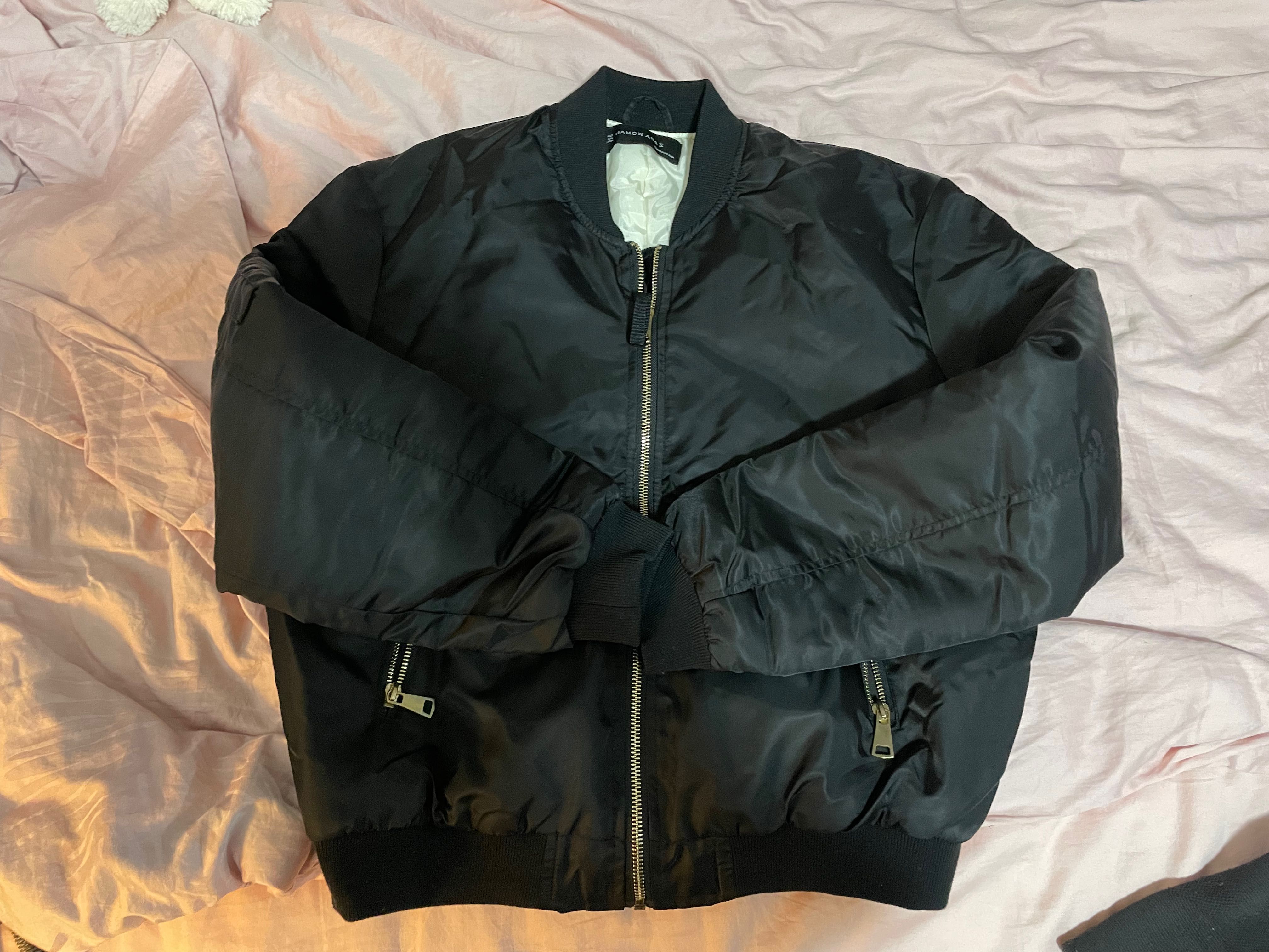 Lined Black bomber jacket with golden zipper
