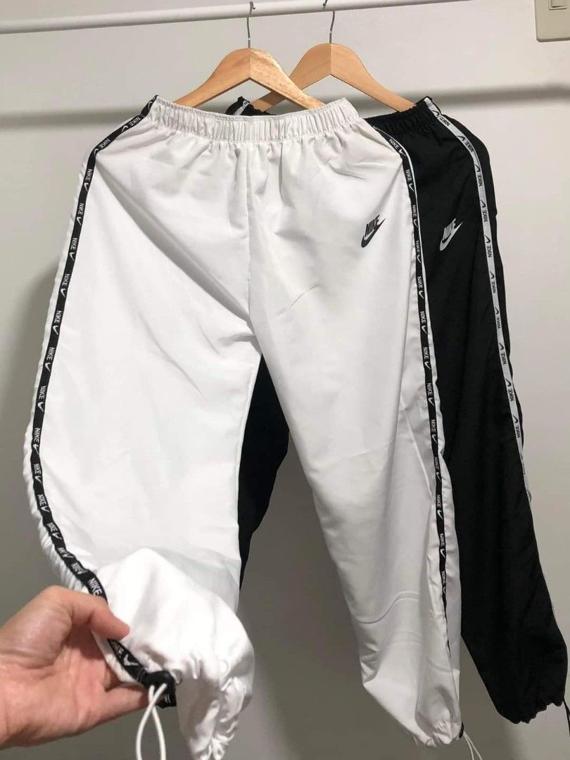 NIKE BAGGY PANTS w/ SIDE TAPE, Men's Fashion, Bottoms, Joggers on Carousell