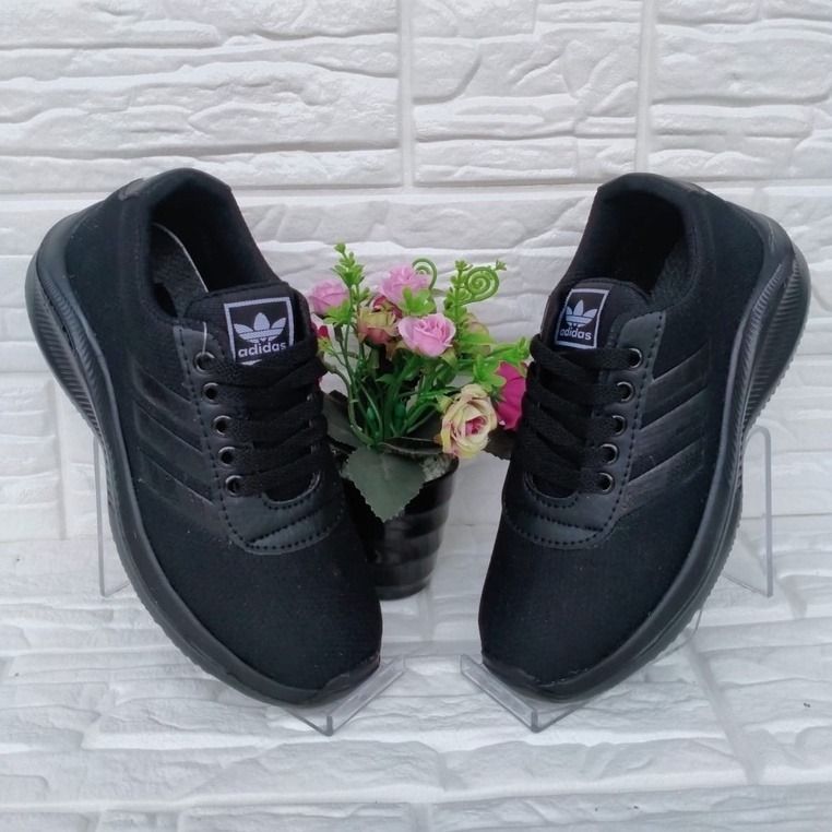 All black top sneakers grade school