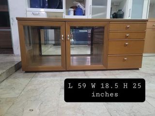 Wooden Tv rack
L59 W18.5 H25 inches
✅Japan surplus 
✅Solid hard wood
✅Glass doors
✅Glass shelf
✅4 pull out drawers
✅On hand, ready to deliver
✅Location: Quezon city
❗Delivery via lalamove