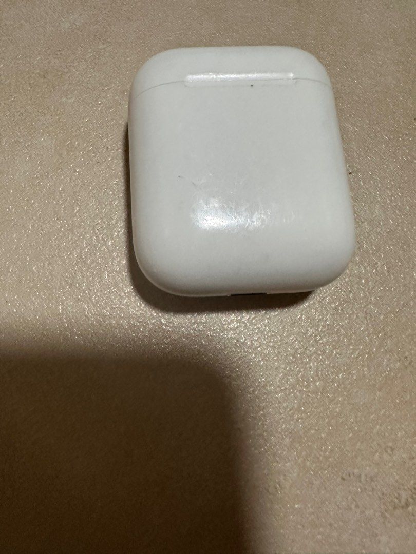 Apple AirPods 1 (defective but charging) (Category: Others) located in Taytay. Submitted by alyza2closet (Listing ID 1205045502, Image 2). Description: Defective but charging Easy low battery of ear pods when connected Power charging is functional Ear pods is charging but instantly low battery when in used.