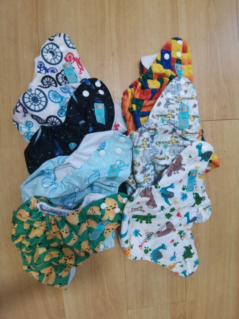 Bundle Cloth diaper with inserts (Category: Diapers & Baby Wipes) located in Bulacan. Submitted by ryzaaaaaa (Listing ID 1205071503, Image 1). Description: PTPA thank you🥰 Preloved Cloth diapers! 4pcs Cover type (cost 430) 7pcs Alva Cloth diaper (cost 1800) With 7pcs 5-Layer Bamboo charcoal inserts 1500 na lang! Barely used. Hindi kinaya mag-cloth diaper🤣 Loc: Bulacan MOP: gcash, bank transfer Courier: Shopee, J&T, LBC.