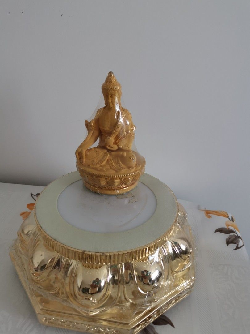 Electric Buddha (Category: Religious Items) located in Singapore. Submitted by vtmpl (Listing ID 1205073737, Image 1). Description: A gift from someone. Unopened for long time, no box . Pick up at Senja Close.