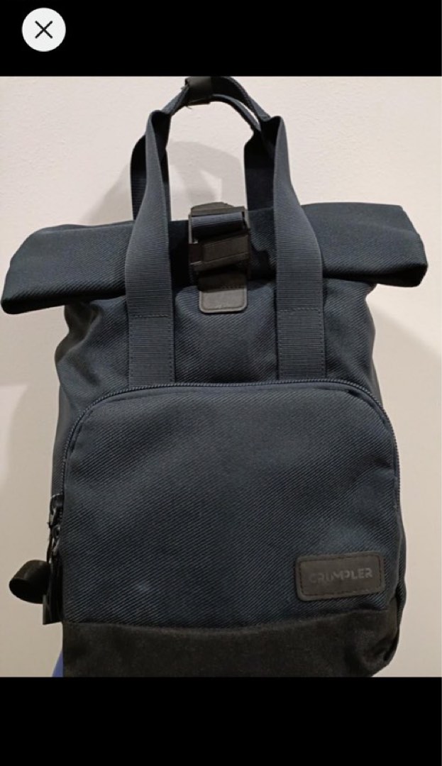 Crumpler roll top backpack hotsell