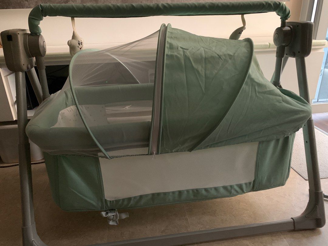 Rocking baby cot, Babies & Kids, Baby Nursery & Kids Furniture, Cots & Cribs on Carousell