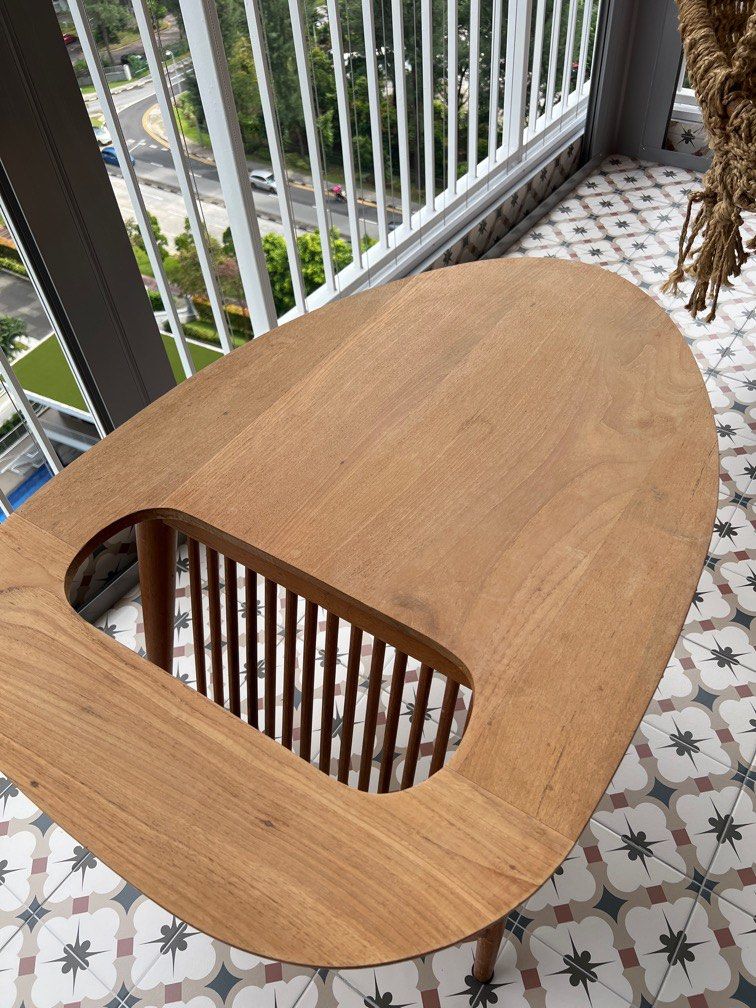 Solid wood coffee table (Category: Tables & Sets) located in Singapore. Submitted by insomnia12 (Listing ID 1205060113, Image 1). Description: Unique coffee table. There’s a crack as shown in the picture. .