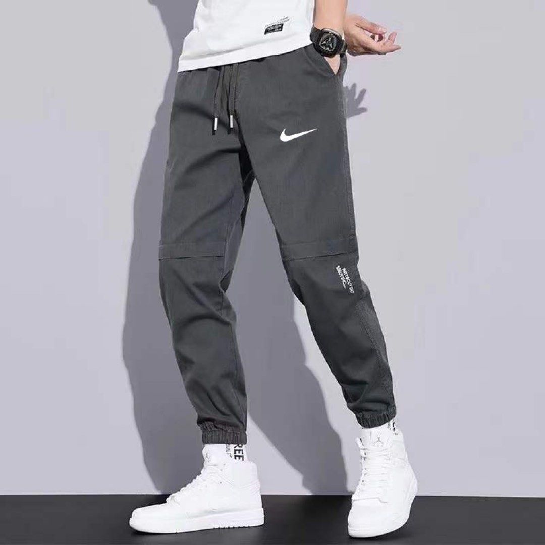 Nike Solid Men Blue Track Pants – Sports Station India