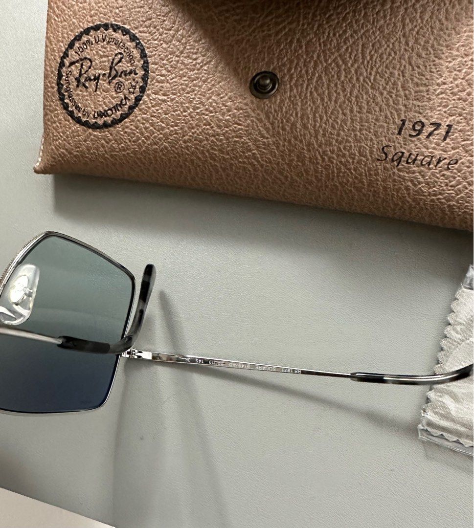 Authentic Rayban 1971 Square Evolve (Category: Sunglasses & Eyewear) located in Malolos. Submitted by dcops (Listing ID 1205348200, Image 3). Description: Authentic Rayban 1971 Square Evolve - Complete inclusions with box, rayban cleaning cloth, manual - Serial number as shown in the photo - Haven’t used, fitted only kaya nakatambak lang - Bought from SM North Edsa Department Store (no receipt) - Good as brand new RFS: Decluttering, not used Paym