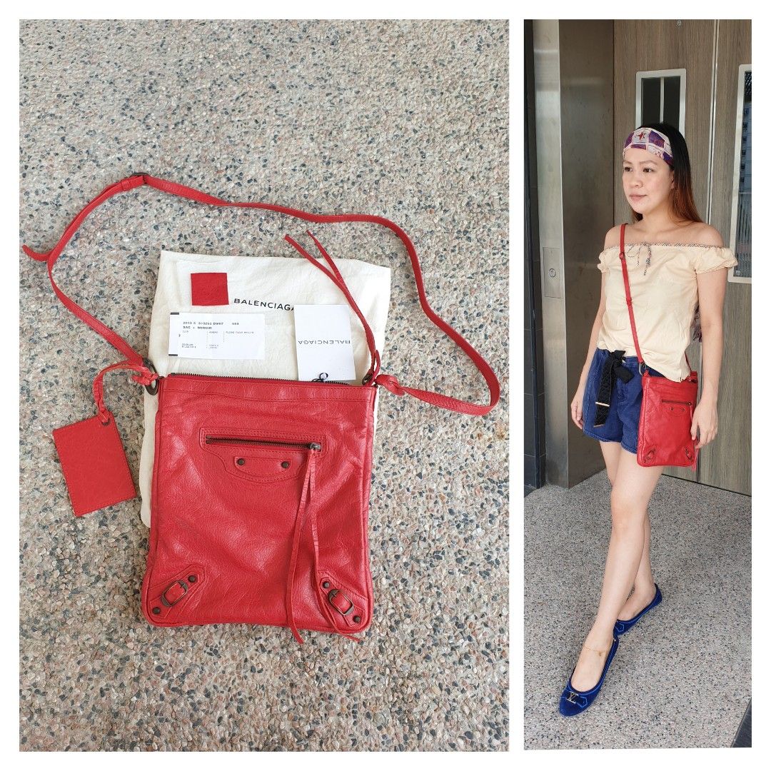 Balenciaga Classic Leather Studs Sling Bag (Category: Luxury Bags & Wallets) located in Davao. Submitted by declutter14 (Listing ID 1205278509, Image 1). Description: Preloved AUTHENTIC Balenciaga Agneau Classic Red Leather Studs Flat Sling Bag •dustbag, mirror, leather sample, cards •SG BASED**SG TO PH 25,000 FREESF •PAYMENT: ML LHUi Only BAWAL SA BARAT, MAARTE. NOT UKAY² NO LAY AWAY....WLANG BUDGET PIKIT MUNA.