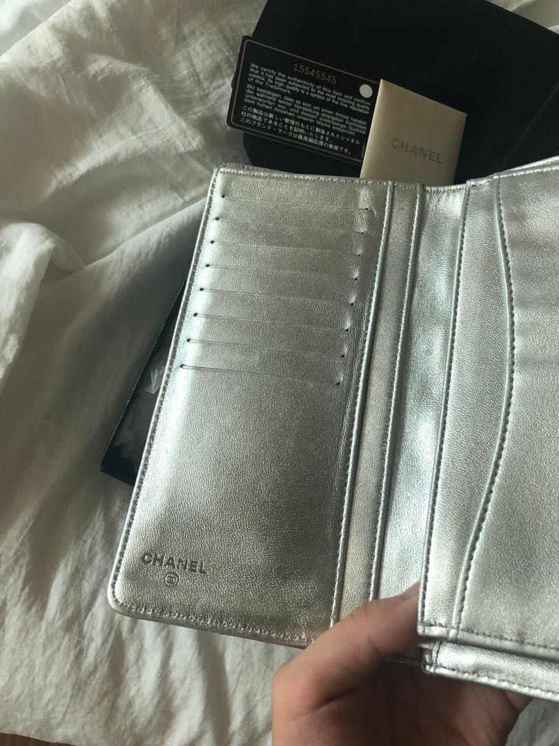 Authentic Chanel Wallet (Category: Bags & Wallets) located in Seremban. Submitted by wafflebites (Listing ID 1205356927, Image 2). Description: Come with box,care card, hologram. Lamb skin in silver colour , 8 card slots , zip available. It’s a very elegant champagne silver colour which i use as a clutch during dinner event . Have been brought for fews years so normal minor scratches on the surface in some part. Not for fussy buyer .Condition 7/1
