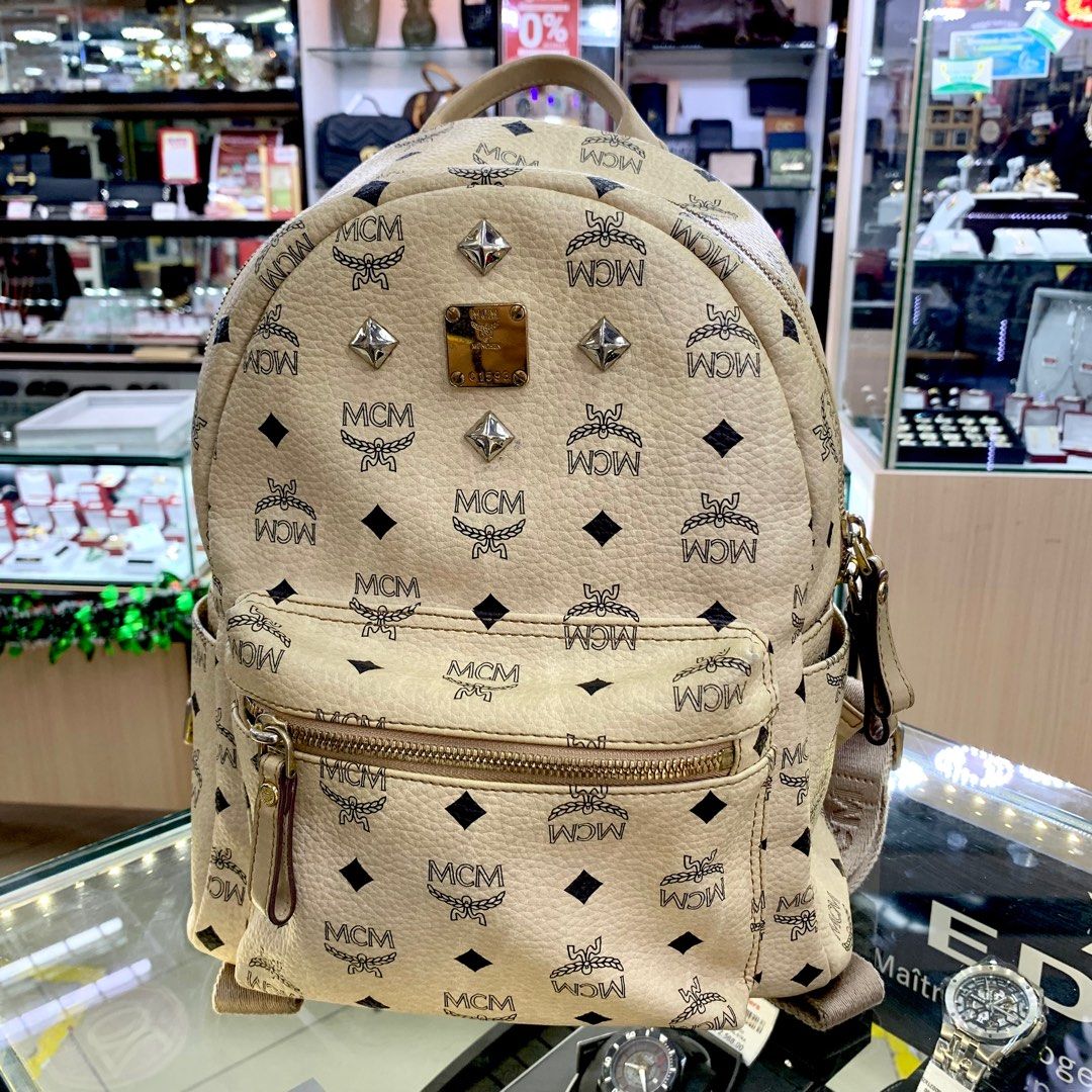 Cream mcm bag clearance