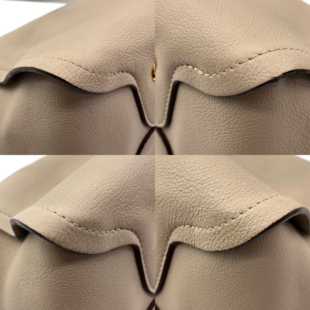 Louis Vuitton Tournon Taurillon Leather Hobo Bag Galet